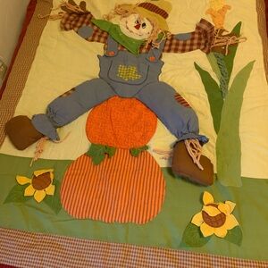 Scarecrow Quilt with Pumpkin and Sunflower Design